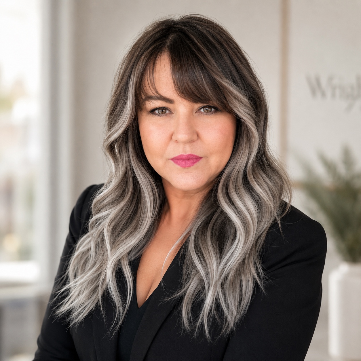 Jo Wright, Real Estate Broker, wearing a black suit